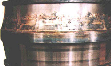 Discolored and melted raceway on inner ring of SRB.