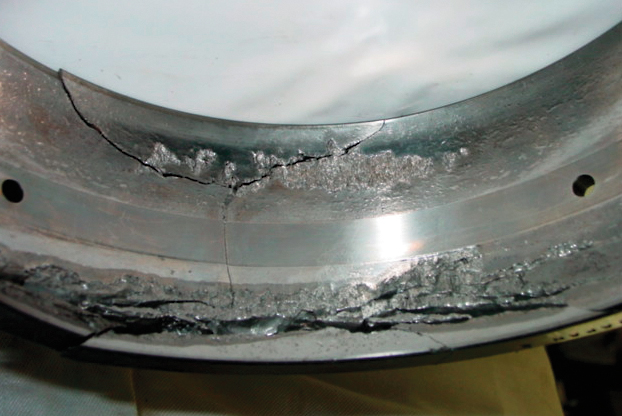 Flaking and fracture in the outer ring raceway of a spherical roller bearing